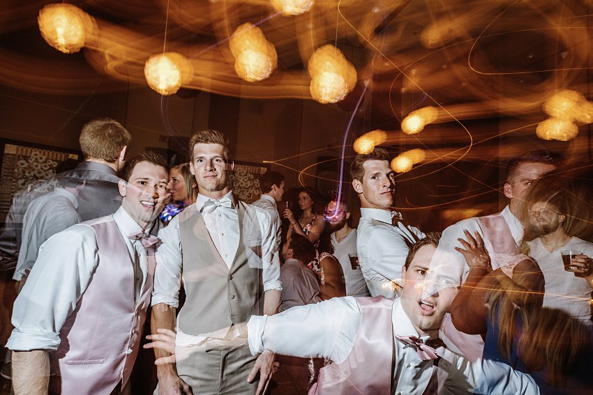wedding reception photo of guys being funny