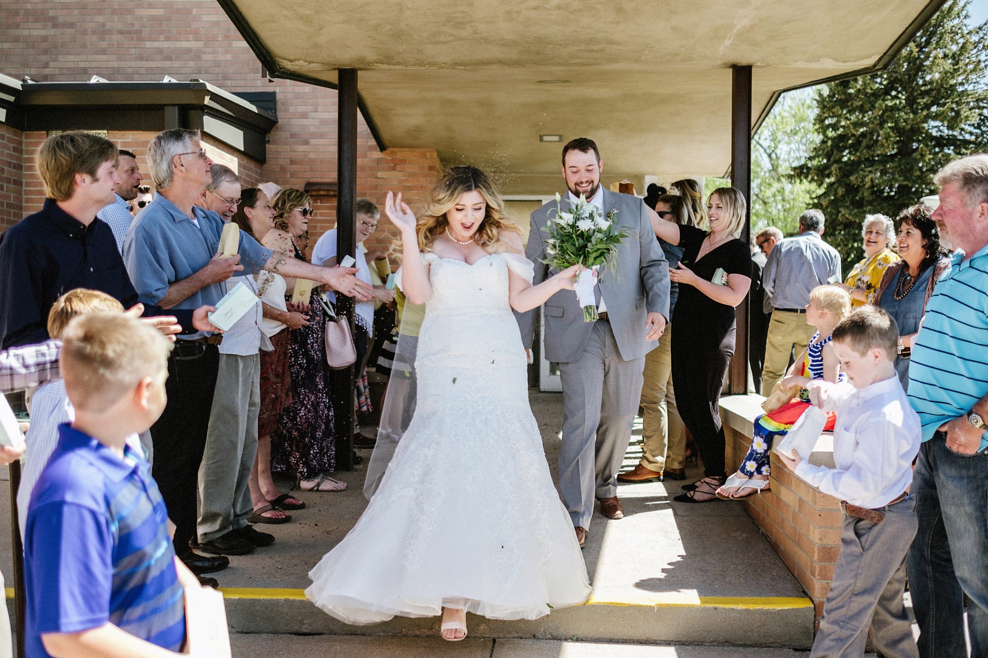 guests throwing lavender, recessional, receiving line