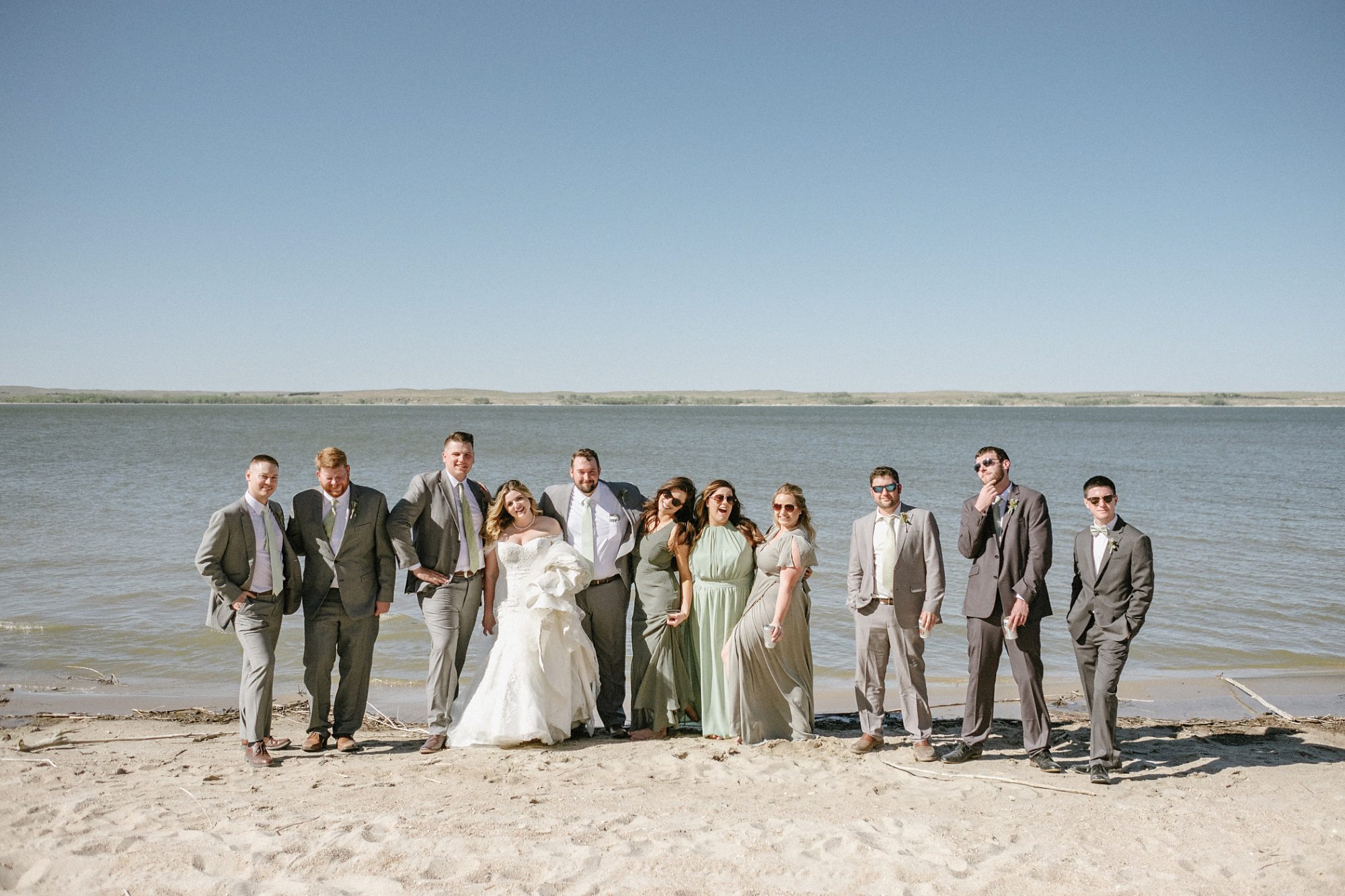 wedding party, bride, groom, lake mcconaughy, beach, sand